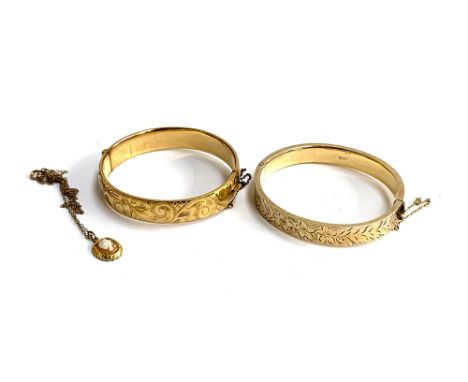 A 22ct gold plated silver bangle, hallmarked JS, Birmingham; together with a 9ct gold metal core bangle; and a rolled gold ca