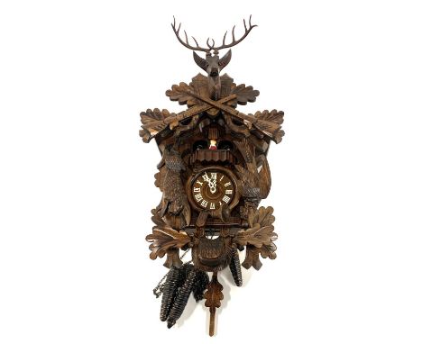 A Black Forest carved cuckoo clock, approx 42cmH 