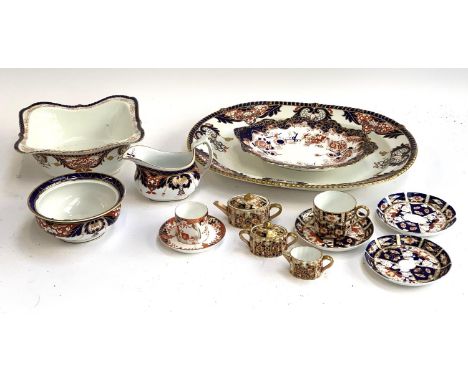 A quantity of Royal Crown Derby ceramics to include coffee cup and sauce; meat plate; teacup and three saucers; serving dish;