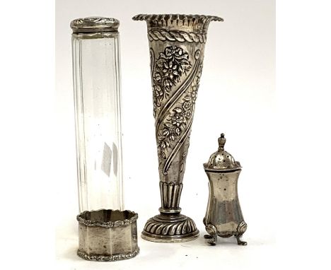 A loaded chased silver spill vase, William Comyns &amp; Sons, London 1901, 16.5cm high; together with a silver napkin ring; a