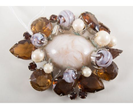 Christian Dior 1960 paste set brooch, oval cabochon marbled paste to centre surrounded by faux pearls and faceted amber colou