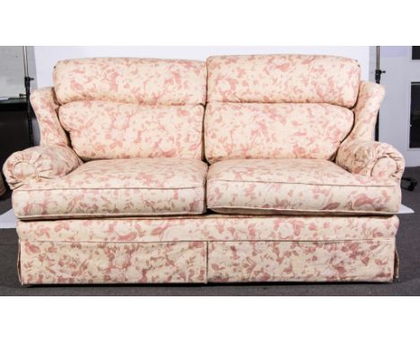 Modern bed settee, upholstered in floral print.