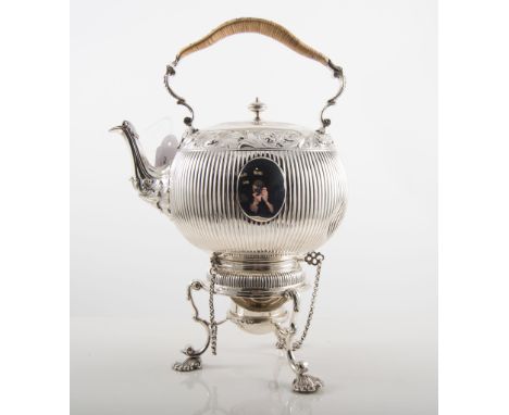 Silver spirit kettle, spherical form, fluted and with a scrolled embossed band, cane-bound handle, on a tripod stand with she