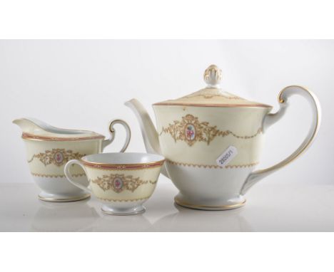 Noritake tea service for eight, teapot, cups and saucers, soup and dessert bowls, main plates, oval platters.