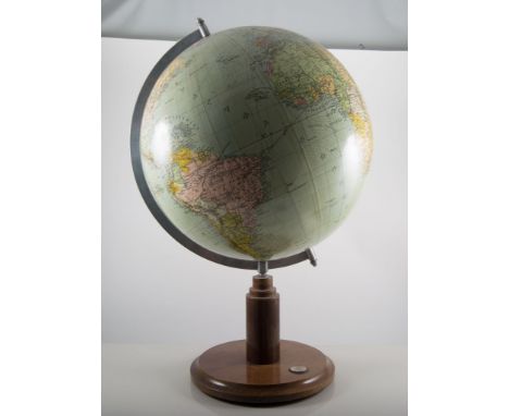 Terrestial globe, probably1960s, wooden stand, incorporating a compass, 56cms overall.