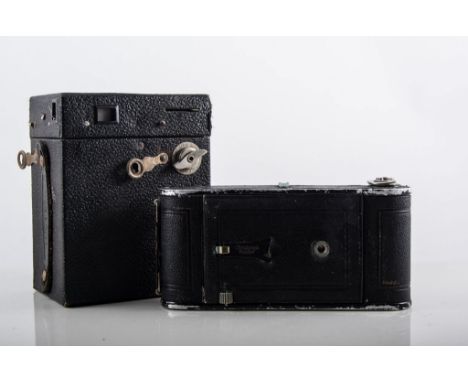 Various vintage photographic film developing equipment, two cameras, boxed trident.
