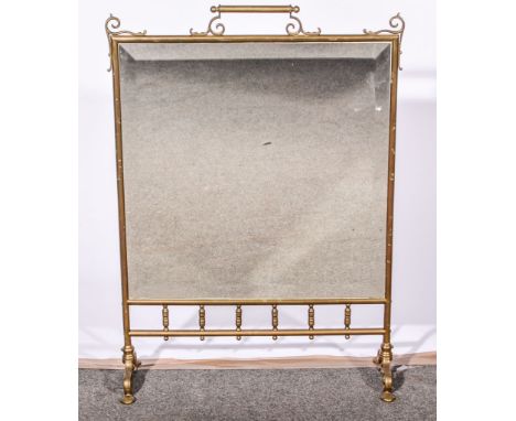 Brass-framed fire screen, inset with a bevelled mirror panel, width 55cms, height 78cms.