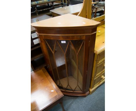 Modern yew wood corner cabinet, bow front, with a glazed door, bracket feet, height 108cms, a pair of yew wood side tables, f