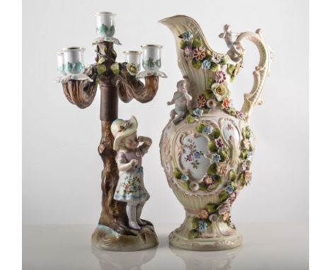 Continental porcelain five-light candelabra, rose encrusted, modelled with a girl, (restored), 36cms, a pair of similar candl