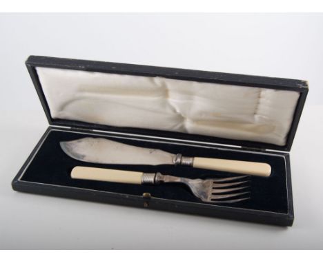 Set of twelve electroplated fishes knives and forks, silver ferrules, ivory handles, in a fitted light oak case, other cases 