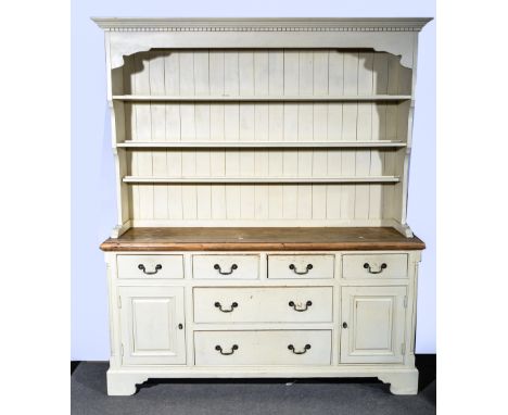 Pine kitchen dresser, part painted dentil and moulded cornice, panel back with three fixed shelves, base with a rectangular t