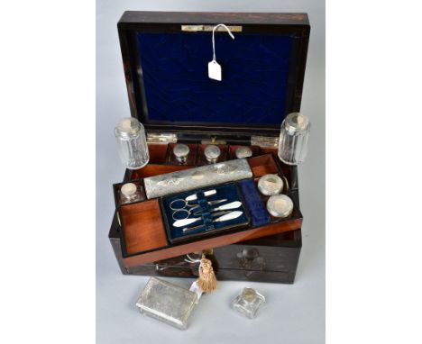 A VICTORIAN COROMANDEL DRESSING/JEWELLERY CASE, the hinged lid with rectangular cartouche bearing monogram, the interior fitt