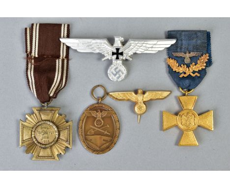 THREE GERMAN 3RD REICH MEDALS/CAP devices to include a German Wehrmakt 25 yr service medal, with blue ribbon attached, crosse