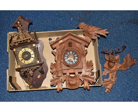 A 20TH CENTURY BLACK FOREST CUCKOO CLOCK, Stag's head pediment loose and s.d to antlers, plastic dial with Roman numerals, wo