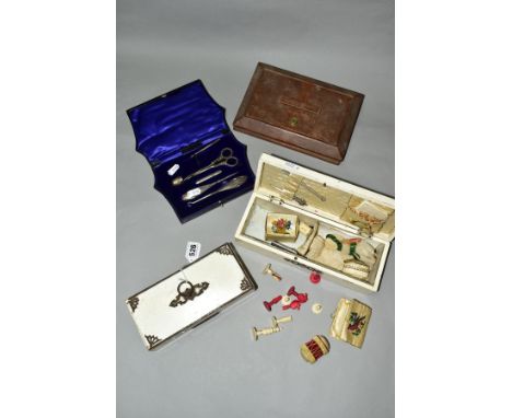 A VICTORIAN MORROCO EXPANDING BOX, A SILVER MOUNTED SEWING SET, TWO VICTORIAN WHITE PAINTED BOXES OF COLLECTABLES AND STAINED