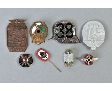 A SELECTION OF GERMAN 3RD REICH TINNIE BADGES, STICK PINS etc to include, thirty eight Stahlhelm badge possibly silver, very 