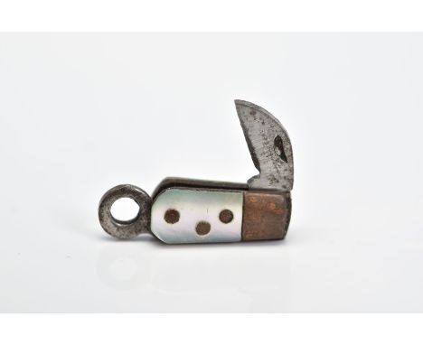 A MINIATURE PENKNIFE, with mother of pearl handle and small folding blade, length extended 17mm