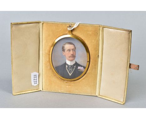 AN EARLY 20TH CENTURY OVAL PORTRAIT MINIATURE OF AN GENTLEMAN, on ivory with card backing, glazed back, mounted in a brass fr