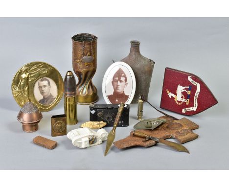 A BOX CONTAINING VARIOUS ITEMS OF WWI TRENCH ART ITEMS including a shell fashioned into a vase, dated Nov 1917, inert shell, 