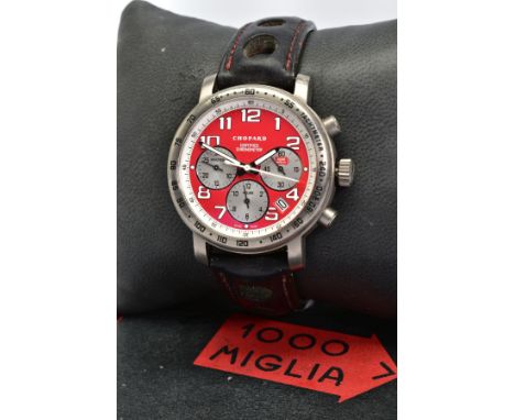 A STAINLESS STEEL CHOPARD 1000 MIGLIA CHRONOGRAPH AUTOMATIC WRISTWATCH, red dial with bold Arabic numerals, silvered inner di