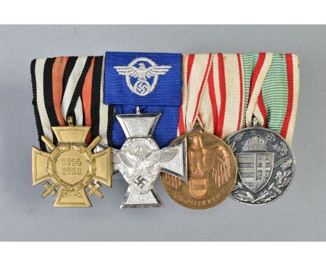 A WWI/WWII GERMAN IMPERIAL/3RD REICH MEDAL BAR OF FOUR MEDALS as follows, L to R 1914-1918 Combatants Cross with swords, Germ