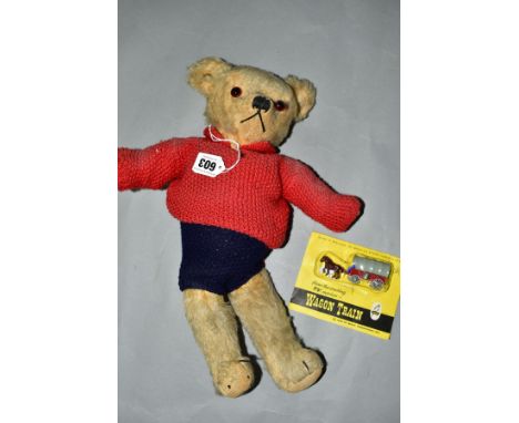 A VINTAGE 1930'S MERRYTHOUGHT MOHAIR PLUSH TEDDY BEAR, vertical stitched nose with the two dropped outer stitches, inverted Y