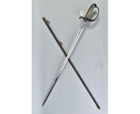 MILITARY SWORD, late Victorian/WWI era British Infantry Officers sword with metal scabbard, the grip is ornate with a Crown a