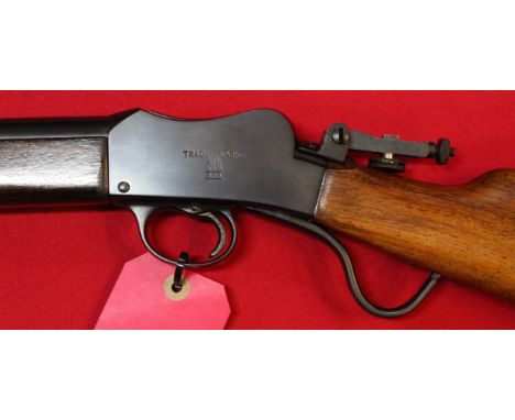 A B.S.A. Martini action .22 r/fire rifle with a B.S.A. peep sight, S/No.41109, this item can only be purchased by someone wit