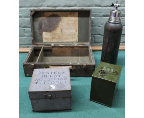 Four various containers including a jungle First Aid box (empty) and a 'Stanley' Super Vac