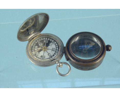 A WWI (dated 1917) military cased compass by Stanley London together with an unusual compass, dated 1906
