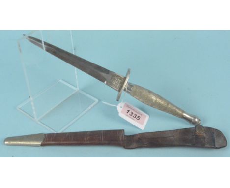 A WWII Mark One F and S fighting knife by Wilkinson Sword Co Ltd London, blade 6 1/8" with correct markings to ricasso, compl