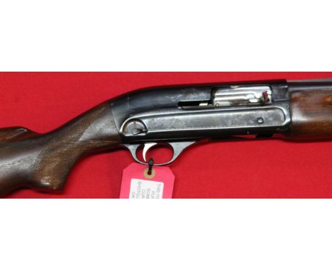 A Baikal 12 bore self loading shotgun with 29" barrels, S/No.N-5285, this item can only be purchased by someone with a curren