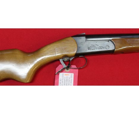 A 12 bore Baikal single shot shotgun with full length sound moderator, S/No.05052511, this item can only be purchased by some
