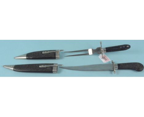 An 'Indian' carving knife and fork set, better quality than the norm