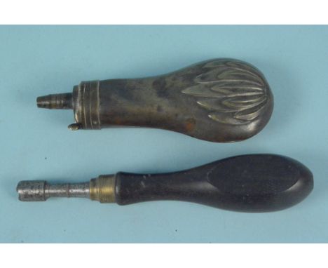 A brass pistol powder flask with a nipple key