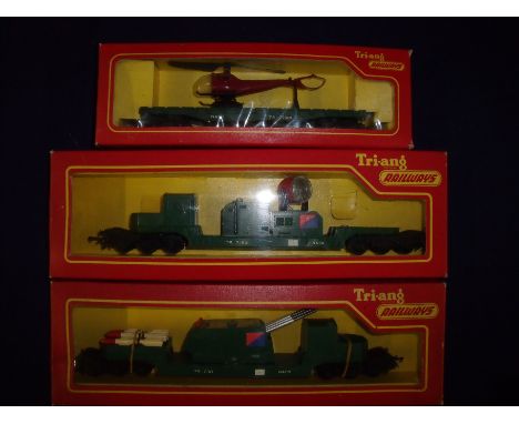 Boxed Tri-ang OO gauge railways R341 Search Light Wagon TR7192 Nato, a TR7191 Nato R3434-Rocket Launcher and a Nato TR7301 R1