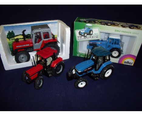 Four die-cast model tractors including Siku 8830 Ford (boxed), Siku  8670 Ford, Siku Case International 956XL 1.32 scale and 