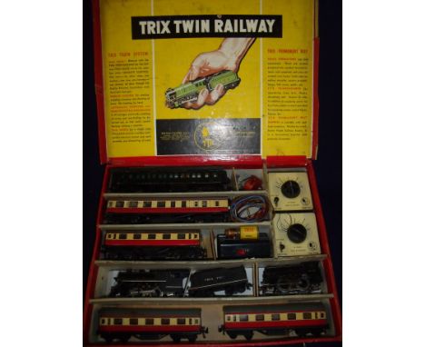 Boxed Trix Twin OO gauge railway box set with American style loco & tender and engine 43427, a selection of various passenger