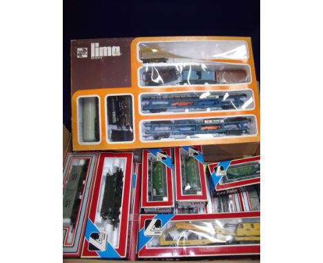 Large selection of boxed Lima freight, goods vehicles, rolling stock including breakdown crane, car transporters etc (13) 