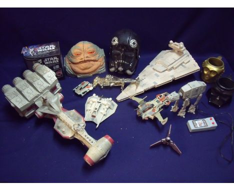 Large selection of Star Wars memorabilia including Feel The Force mug, various model ships, Darth Vader head etc 