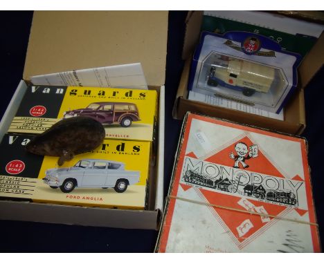 Schuco clockwork mouse, boxed Oxford die-cast Poppy Appeal car, two boxes Vanguard collectors cars and a vintage Monopoly gam