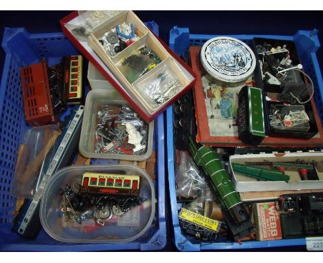 Two boxes containing an extremely large quantity of mostly OO gauge and some O gauge accessories, spares and repairs includin