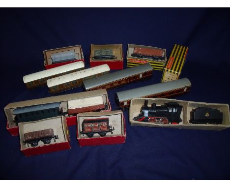 Boxed Trix loco & tender, various passenger carriages and goods wagons including single model brake coach, bogie coach, Priva