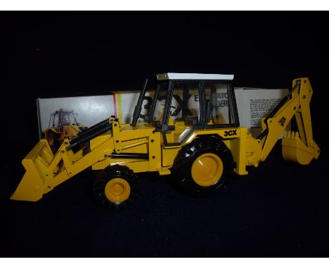 Model JCB Backhoe Loader and rare 1980s die-cast metal model of a JCB 3X Excavator Loader made in Germany in original box 