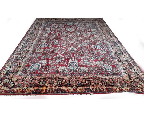 A VERY ATTRACTIVE BURGUNDY GROUND SAROUK CARPET, Northwest Persia, with all-over stylised floral pattern, on burgundy ground,
