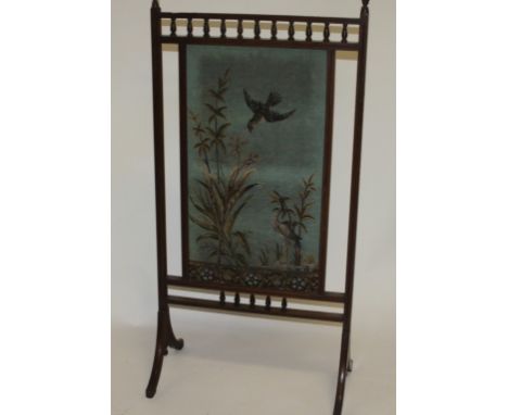 AN EDWARDIAN MAHOGANY CHEVAL FIRE SCREEN, with bead tapestry panel, under a gallery top, and raised on four splayed legs, 50"