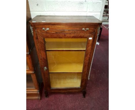 A CONTINENTAL INLAID AND BRASS-MOUNTED KINGWOOD VITRINE OR DISPLAY CABINET, the rectangular top with front rounded corners, a