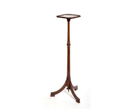 A TRIPOD JARDINERE STAND OR TORCHERE, the square top with angled corners and two-stage turned stem above a tripod base, 42” (
