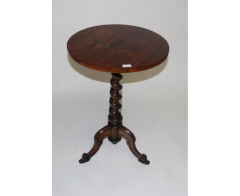 A VICTORIAN CIRCULAR ROSEWOOD OCCASIONAL TABLE, with spiral reeded stem, on a tripod base with cabriole legs, the underside b