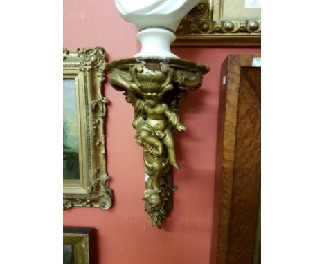 AN ATTRACTIVE PAIR OF NINETEENTH CENTURY GILT AND GESSO WALL BRACKETS, each with shaped shelf, and cartouche front, supported